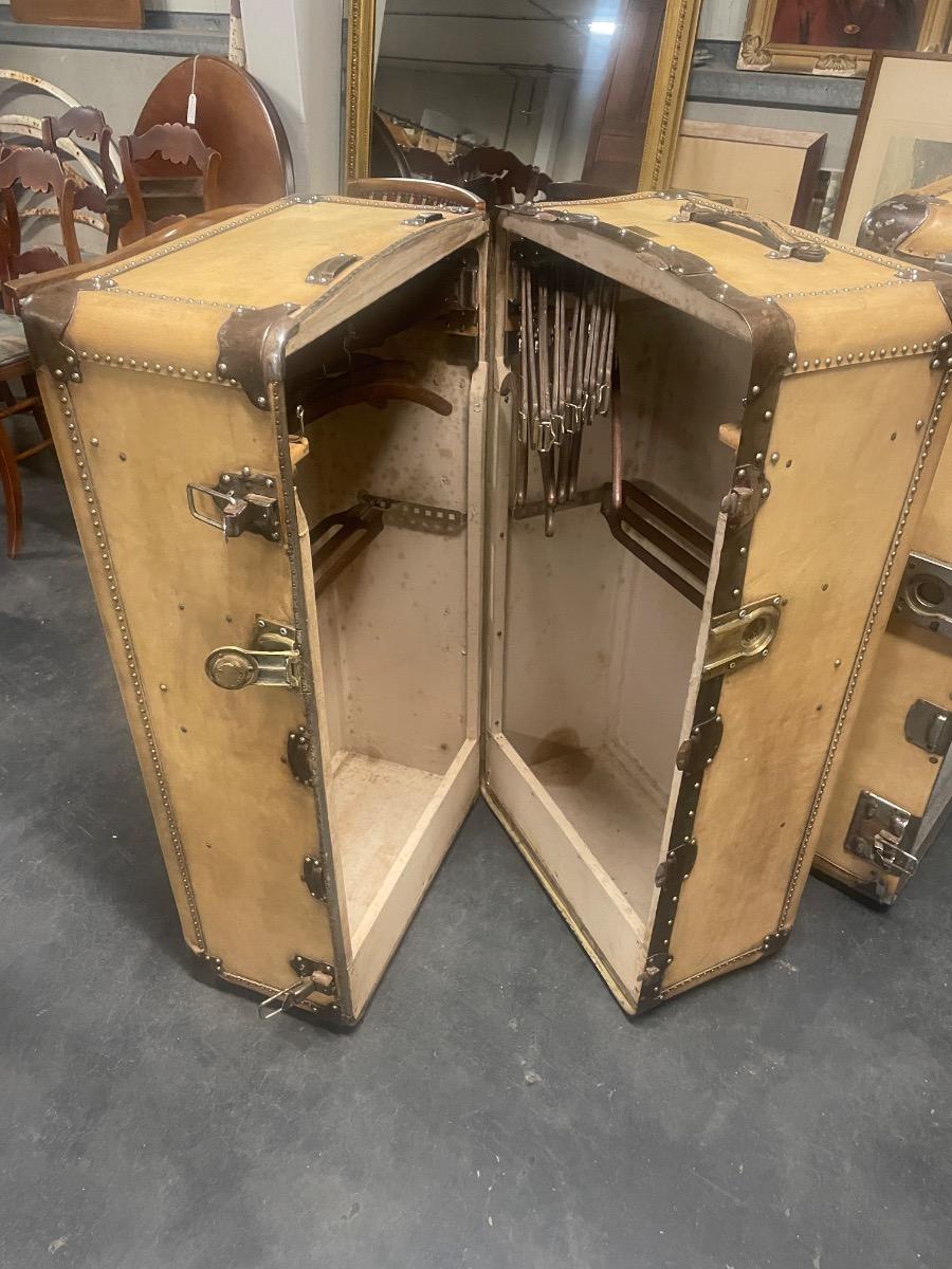 An unusual set of 4 suitcases