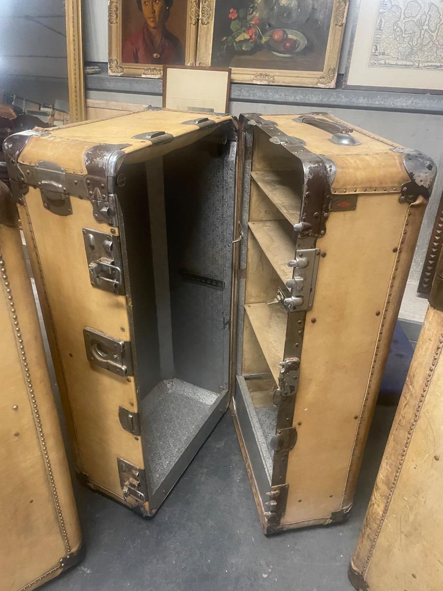 An unusual set of 4 suitcases