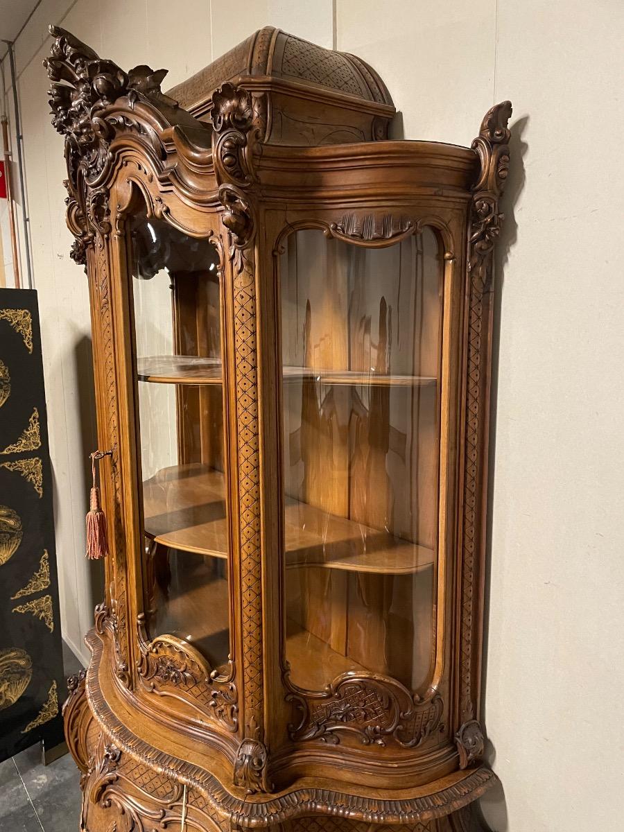 Beautiful Louis XV style walnut carved vitrine. 223 cm high