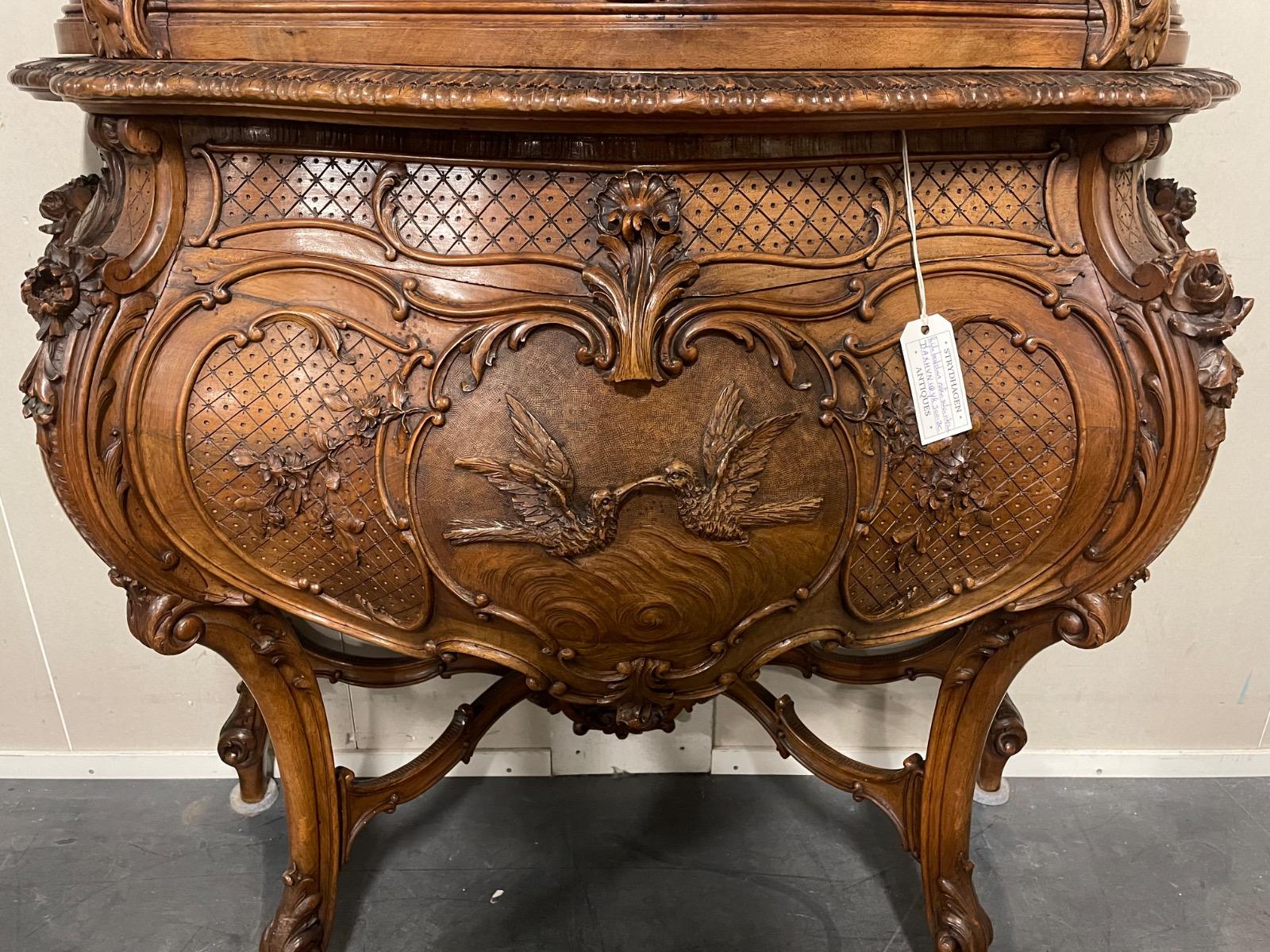 Beautiful Louis XV style walnut carved vitrine. 223 cm high