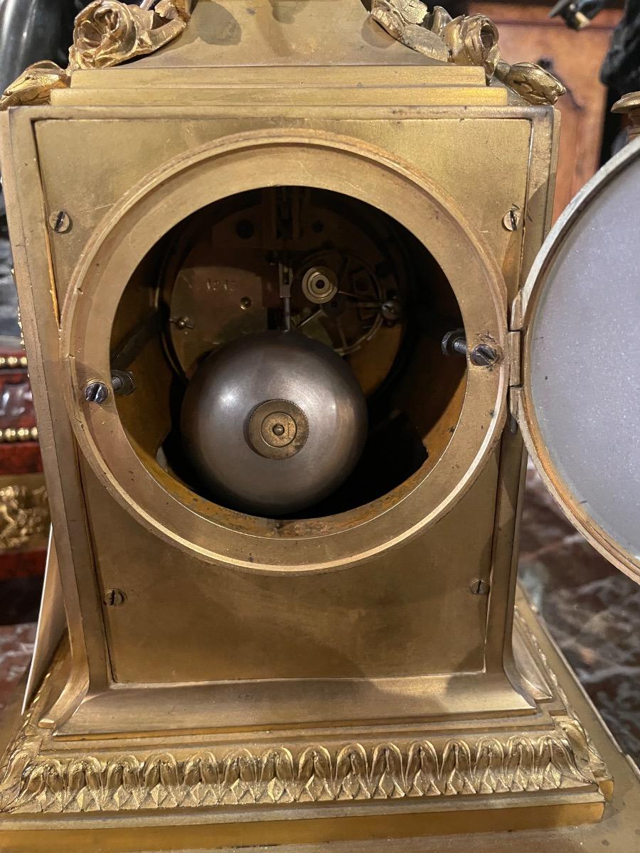 Bronze gilded clock set by Raingo Frères a Paris. 33cm high