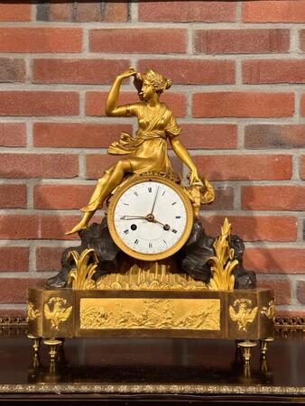 Bronze Gilded Empire Clock of Diana signed Mugnier Horloger de l’empereur et Roi”, 11x40x48h cm