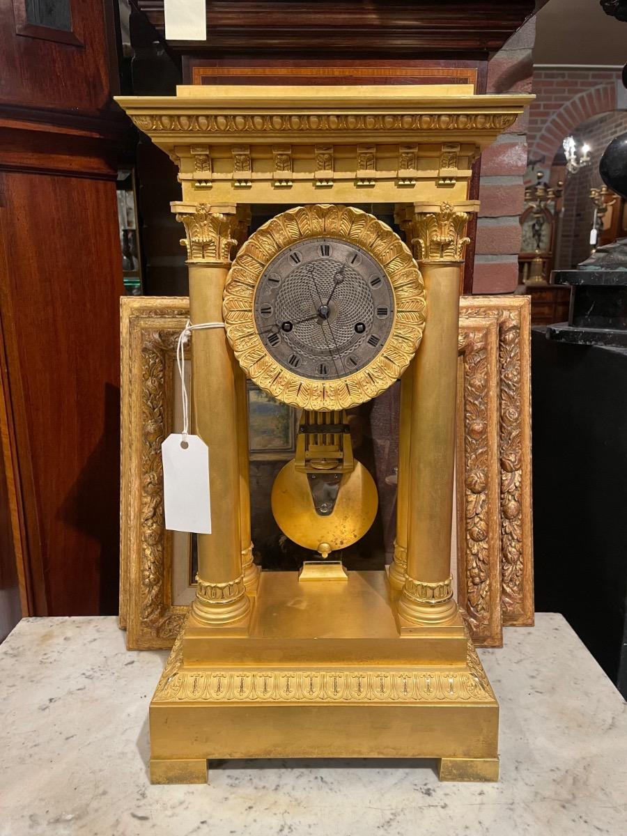 Bronze glided portico clock by Chapuis à Marseille. 59h cm