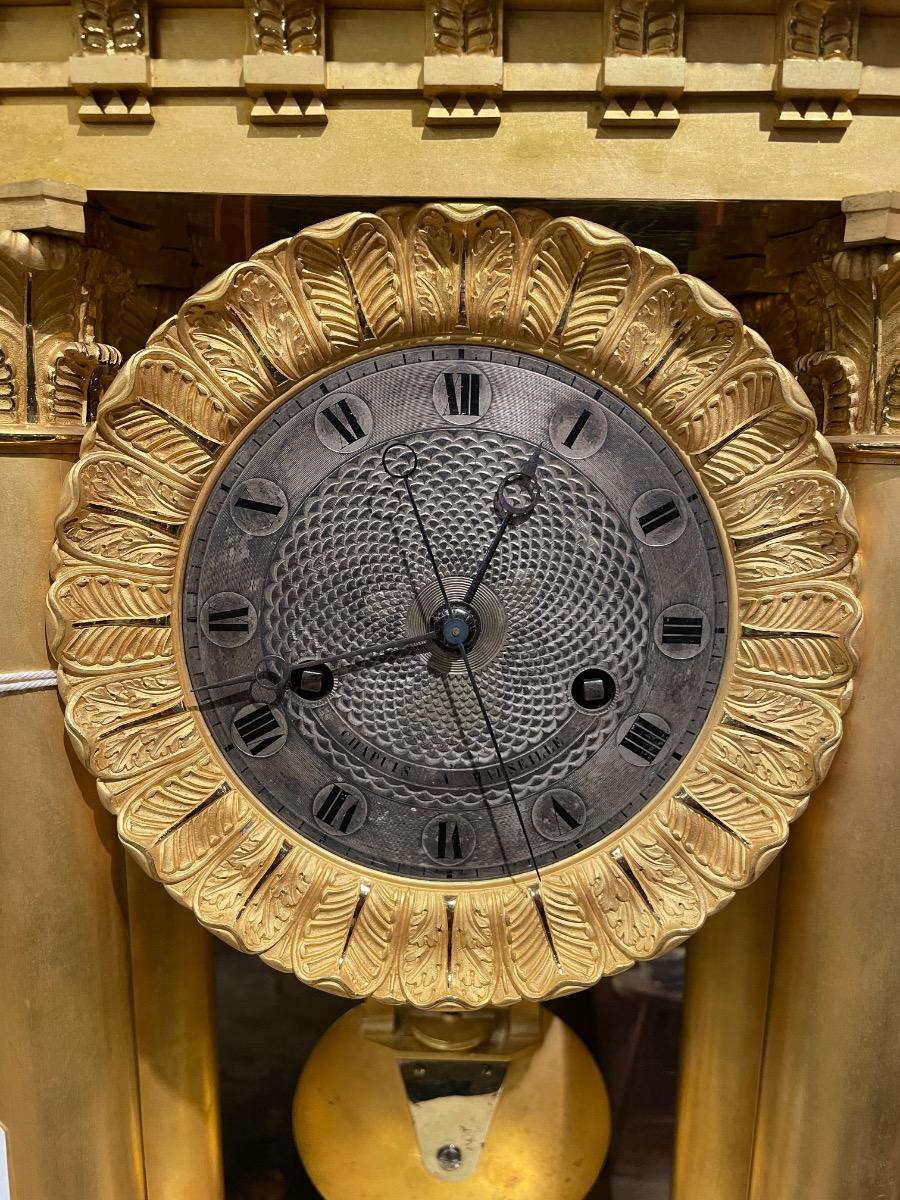 Bronze glided portico clock by Chapuis à Marseille. 59h cm