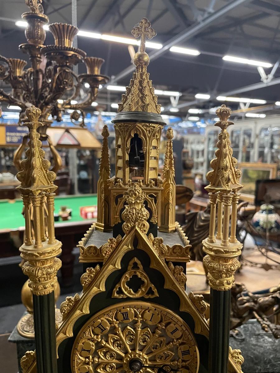 Bronze neo gothic cathedral clock with bell in top and gong in base. 64 cm tall