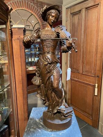 Bronze violin player, signed G. Gayton. 98 cm tall