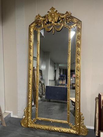 Impressive 19th century mirror in gilded frame. 140x250h cm